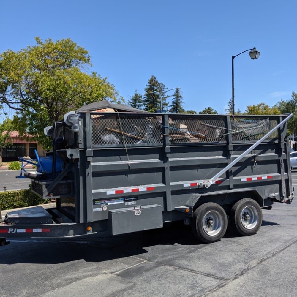 R&D Trash Disposal trailer — junk removal throughout Broward County